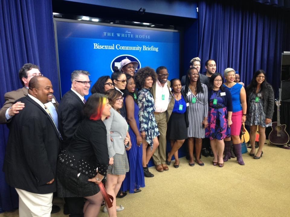 A group photo of people of color posing at the Bisexual Community Briefing at The White House.